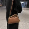 2024 New Designer womens crossbody shoulder sense saddle spring clip cloud dumpling Messenger bag