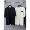 Das neue Kurzarm-Sportbekleidungsset für Herren und Damen des Luxusdesigners Shirt High Edition Coke Black Tape Fuzzy Print Kurzarm und lässiges T-Shirt