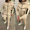 Herrspårar modem och modar MODE TRACKSUPT SPRING Autumn Solid Color Polyester 2st Hoodie and Pants Casual Sportswear Fitness Jogging Suit