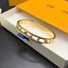 Luxo ouro jóias designer pulseiras mulheres manguito pulseira masculino marca 18k banhado a ouro 925 prata banhado com padrão esmalte aço inoxidável