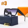 Fahsion Cool Gafas de sol para hombres y mujeres Gafas de sol de verano con caja 8 colores