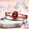 Montres-bracelets élégantes en or rose, cadran rouge, double date, montre à quartz étanche