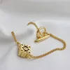 Klasyczna projektant bransoletki biżuteria luksusowe mody biżuterii 24k złota nie zanikające bransoletki żeńskie lekkie luksusowe wysokie zmysł bransoletki złota biżuteria