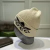 Designer clássico outono inverno estilo quente gorro chapéu de malha chapéus homens e mulheres moda universal boné de malha outono lã ao ar livre quente crânio bonés G2311910PE-5