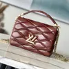 explores Women's bags new M23601 M22891 GO-14 MM handbag Nicolas Ghesquiere lambskin quilted toasted chain Twist lock leather Smoked Tan Cowhide mirror