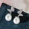 Boucles d'oreilles pendantes CAOSHI Gracieuse Goutte Papillon Avec Zircone Brillante Élégante Perle Simulé Pendentif Accessoires Pour La Cérémonie De Mariage