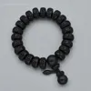 Charm armband mode lychee 15mm svart naturlig persika trä buddha pärlor armband hand snidade tibetanska buddhistiska smycken
