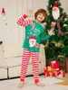 Familjsmatchande kläder Julpyjamas vuxna och barn pyjamas Santa Topsstripe Pants Xmas Sleepwear Baby Boy Girls Romper 231109