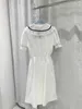 Vestidos casuais básicos designer 2023 verão nova marinha estilo academia renda borda bolha mangas curtas embrulhar cintura para vestido de redução de idade fino e doce va2r