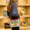 2024 New Designer women's crossbody shoulder can be and mixed batches parent-child children's hand-held personality niche bow hand carry bag