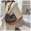 2024 New Designer women's crossbody shoulder selling hot drill underarm Rhinestone glittering French stick messenger chain bag