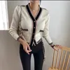 Kvinnors stickor 2023 Fall Winter European Clothes Cardigan Sticked tröja chic sexig randig knapp upp kvinnor långärmad avslappnad toppar 311003