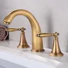 Rubinetti per lavandino del bagno Freddo e lavabo Tutti in rame con doppia maniglia a tre fori sotto il lavabo da appoggio tipo diviso