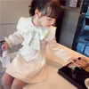 Robe de fille pour enfants adolescents Big Bow Doll Collar mariage robe de fête de la mode printemps au printemps