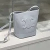 Kadın çanta CE bölünmüş kova deri çanta haberci tuval çanta tasarımcısı kova cel cowhide güzel bir kapasiteye sahiptir Zaferle kemer kova kovası çantası Yeni Premi 812k