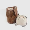 Kvällspåsar hink för kvinnor lyxiga designer handväskor pursar 2023 vintage med inre fickhand greppmönster axel crossbody