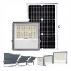 Lumières d'inondation solaires 100W 200W 300W 400W Lumières d'inondation solaires Lentille de coque en aluminium Perles LED haute luminosité Ip65 Applique murale de sécurité extérieure Dhhjg