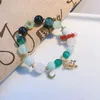 Link bransoletki honkai gwiazda gwiezdna brzeszcza z koralikami dla kobiet kwiat wisiorek zielony bransoletka moda moda biżuteria anime biżuteria