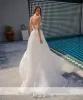 Elegante lange trägerlose Brautkleider aus Tüll, ärmellos mit Spitzenapplikationen, Meerjungfrau, bodenlang, maßgeschneiderte Brautkleider