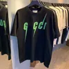 2023 Nueva camiseta de diseñador para mujer de gama alta de alta edición Summer Lightning Green Printed Sleeve T-Shirt Loose Relaxed Unisex Tee