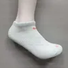 Meias masculinas de grife meias de comprimento médio três pares de meias femininas Macaron meias respiráveis que absorvem o suor e estampa NK