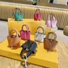 Designer-Tasche, Brieftasche, Mode, neue Kopfhörer-Schutzhülle, Gemüsekorb, kabellose Bluetooth-Tasche, Anhänger weiblich