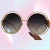 Occhiali da sole rotondi Carlina 114 Goldtransparent Brown Shadod Women Sun Glasses con Case7313454