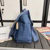 Sac à dos en cuir classique en gros sac d'école rétro simple sac de rangement pour ordinateur dames hommes sac à dos de stockage de voyage neutre sac à bandoulière pour femmes