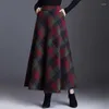 Kjolar vintage rutig lång kjol för kvinnor streetwear elastic hög midja ficka brittisk stil ull a-line tartan paraply