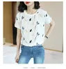 T-shirts pour femmes Chemise pour femmes 2023 Mode d'été Hauts amples Manches courtes Dames Blanc Imprimer Basique 4XL Tempérament Style occidental Mince