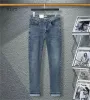 Designer jeans herrar byxor linne byxor hip hop män jeans orolig rippad cyklist smal fit motorcykel denim för män M-3XL FD14