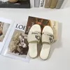 Designersandaler Tofflor Kvinnor Woody tofflor Mules Platta diabilder Broderade Lady Cross vävda tofflor Sommarsemester Utomhus Casual Skor sandaler