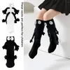 Chaussettes longues noires pour femmes, Kawaii, pour Couple, main dans la main, pour filles, douce poupée Harajuku, en coton