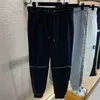 Pantaloni da uomo Designer Autunno/Inverno Nuovo ricamo TB Cerniera Coulisse Pantaloni casual Pantaloni da guardia Leggings ANOI