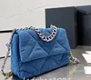2023 Handväskor för kvinnor Luxury Lady Fashion Påsar Blue Quilting Woolen Glitter axel All-Match Top Quality Crossbody Handbag kväll
