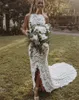 Robe de mariée boho sirène 2023 Backless licou licou fend en dentelle de plage de plage