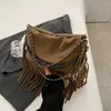 Bolso de hombro Vintage con cadenas de cuero de ante para mujer, bandolera informal con borlas para viajes y vacaciones, bandolera femenina