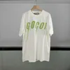 Designer dameskleding 20% ​​korting op het shirt zelf ontworpen zomer groene bliksem mes print mouw t-shirt los fit