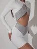 Sukienki swobodne 2023 Autumn Rayon Bandage Kobiety Kobiety z długim rękawem Sexy Holes Bodycon mini sukienka Świętu