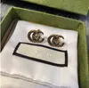 Luksusowy projektant 18K złoty plisowany litera vintage serpentynowe kolczyki stadnin
