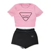 Dames Trainingspakken Designer Tweedelige set Letterprint Blote navel Sexy T-shirt met korte mouwen Shorts Casual sportpak Ronde hals Outfits Effen Joggen