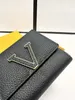 23SS unisex lyxdesigner Solid Color Short Calfskin Crotch Clamshell Money Clip innehåller en dragkedja byte väska med flera kortpositioner mynt plånbok 11cm