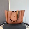 Sac fourre-tout Grand sac de créateur Sac seau en cuir brillant Sacs à bandoulière Sacs pour femmes Sacs à main Sacs à bandoulière de haute qualité NOUVEAU Luxurys Sac de soirée en faux daim en cuir véritable