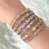 Bracciale rigido JaneKelly alla moda con zirconi cubici per uomo e donna, bracciale baguette, base in rame con spessore color oro