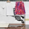 23ss conjuntos para niños conjunto de falda ropa de diseñador para niños niñas Cuello redondo Algodón puro estampado de amor estampado de camiseta Plisado largo Media falda traje Ropa de bebé de alta calidad