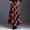 Kjolar vintage rutig lång kjol för kvinnor streetwear elastic hög midja ficka brittisk stil ull a-line tartan paraply