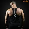 Débardeurs homme Hommes Bodybuilding serré coton débardeurs été Jogger entraînement sans manches chemise homme fronde gilet mâle gymnases Fitness marque vêtements 230410