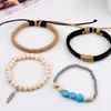 Braccialetti con ciondoli 4 pezzi/set Boho Gypsy Hippie Punk Blu Bianco Turchesi Beige Marrone chiaro Cordoncino Avvolgere Nodi Strati di pelle nera Largo Unisex