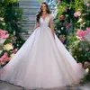 Elegancka sukienka ślubna 2023 Elegancka tiulowe pełne rękawy Peading Pearls Appliques V-Neck Bride Suknie Illusion Back Vestidos de noiva szata de Mariee