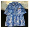 Bluzki damskie koszule Kobiety guziki Koszulka Koreańska moda nadruk swobodny krótkie topy z krótkim rękawem Summer Hawaiian Female Cardigan Blusas 2023wome